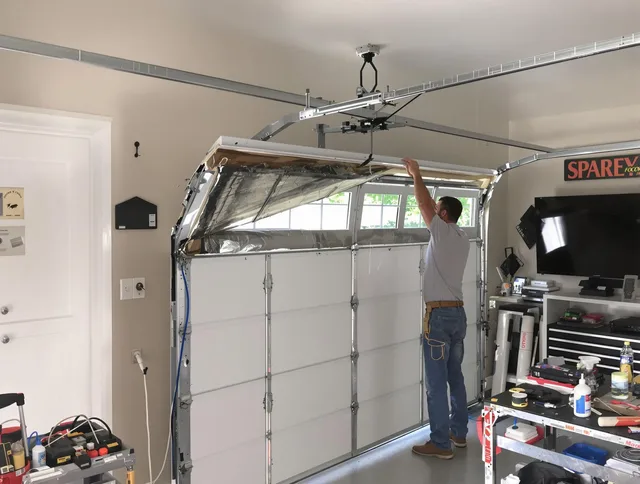 Garage door section replacement by South Windsor Garage Door Repair in South Windsor