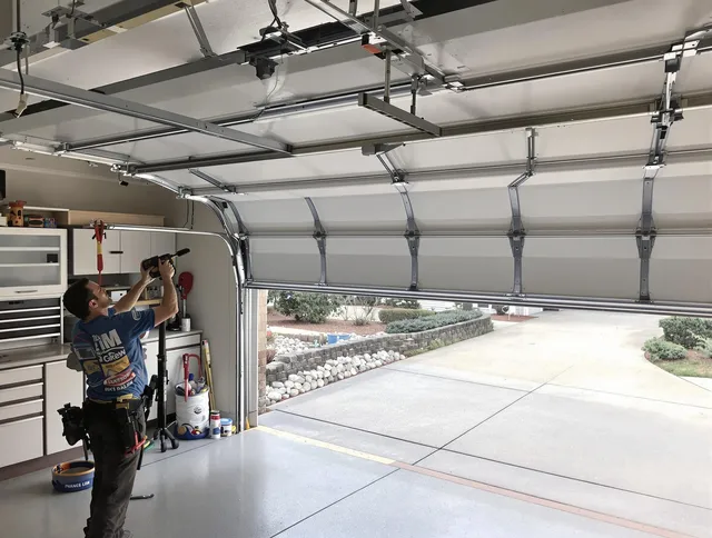 Garage door track repair service by South Windsor Garage Door Repair in South Windsor